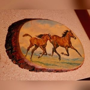 Vintage painting of horses on wood